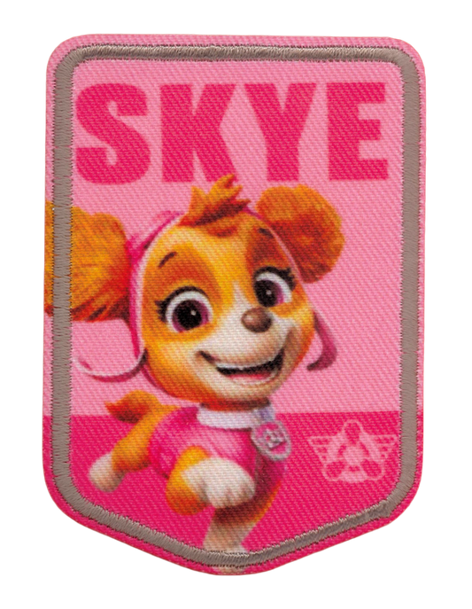 ”Rosa Paw Patrol-tygmärke med Skye i flygarutrustning och texten SKYE upptill.”