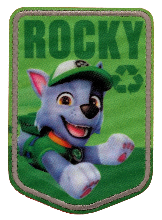 ”Grönt Paw Patrol-tygmärke med Rocky i grön keps och väst, texten ROCKY och en återvinningssymbol.”